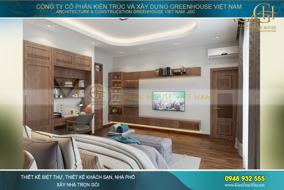 Đối diện giường ngủ là kệ sách và TV treo tường